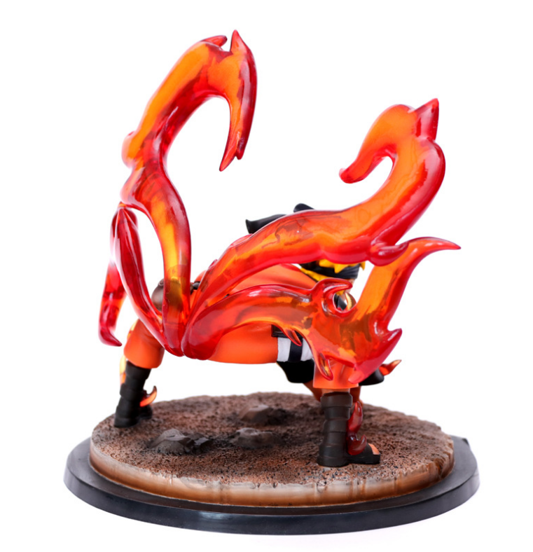 Figurine with fiery red and orange design on a white background
