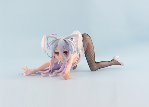 Anime character figurine with purple hair and bunny ears on a light blue background
