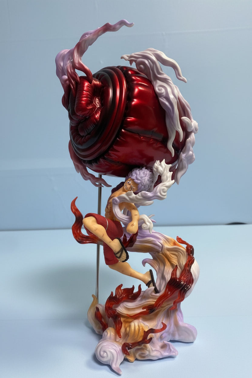 Colorful sculpture with a central red element on a light blue background