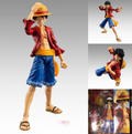 Action figure of a character in a red jacket and blue shorts with various poses on a gray background.