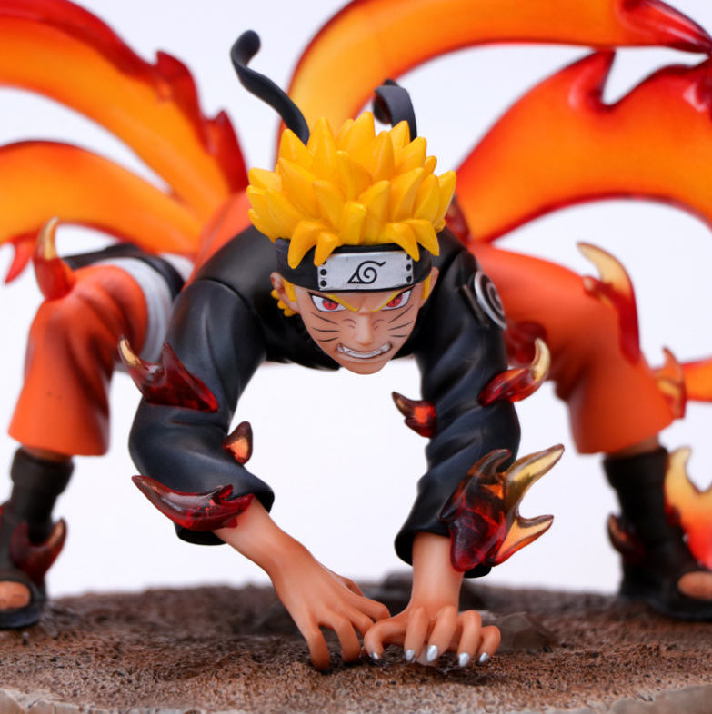 Action figure of a character with spiky yellow hair and orange flames in the background