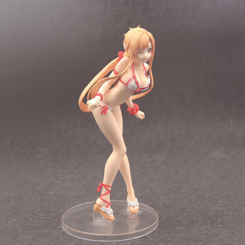 Anime character figurine in a swimsuit on a clear base against a dark background