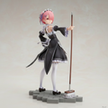 Anime character figurine in a black outfit with a pink hair bow, holding a broom.