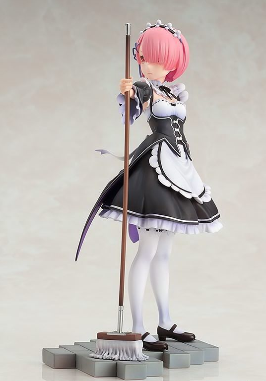 Statue of a character in a maid outfit holding a broom on a gray background