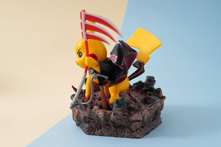 Toy figure with a yellow head and black body on a base with a flag, against a light blue and beige background.