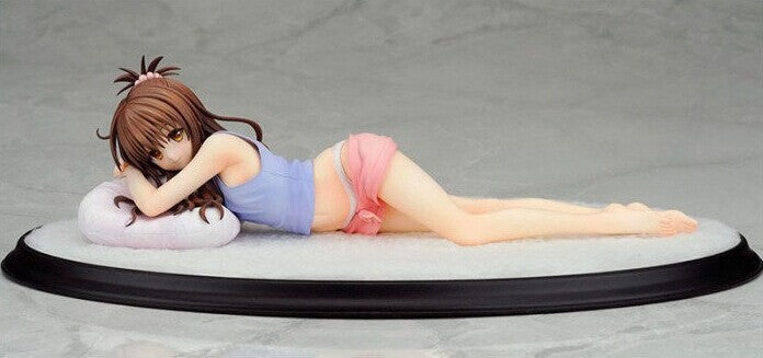 Figure of a person lying down on a gray background