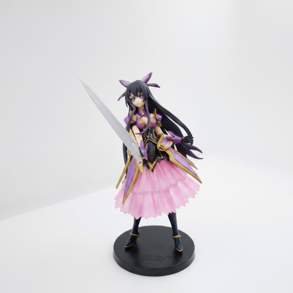 Anime figurine with long black hair, purple and pink outfit, and a sword on a white background