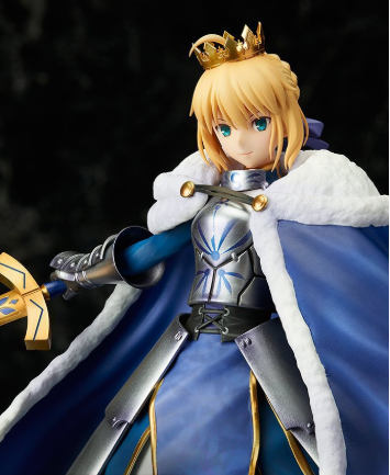 Figurine of a character in armor with a crown and cape, holding a sword against a dark background.